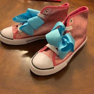 JoJo Siwa pink glitter high tops with blue bow